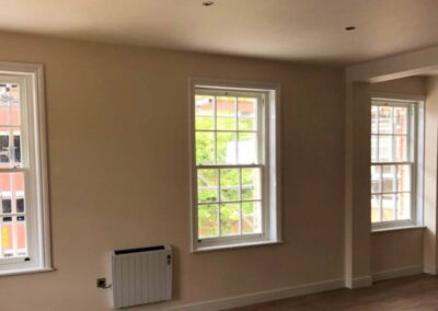 Fitting 134 timber windows and doors, Ipswich