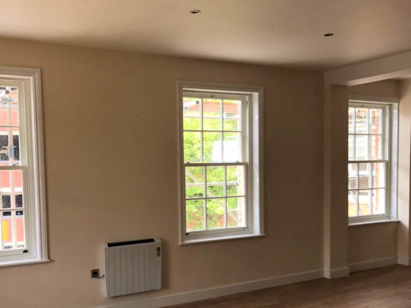 Fitting 134 timber windows and doors, Ipswich